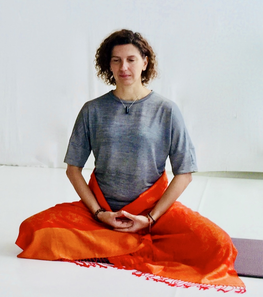 Mata Sakka seated in a calm embodied practice